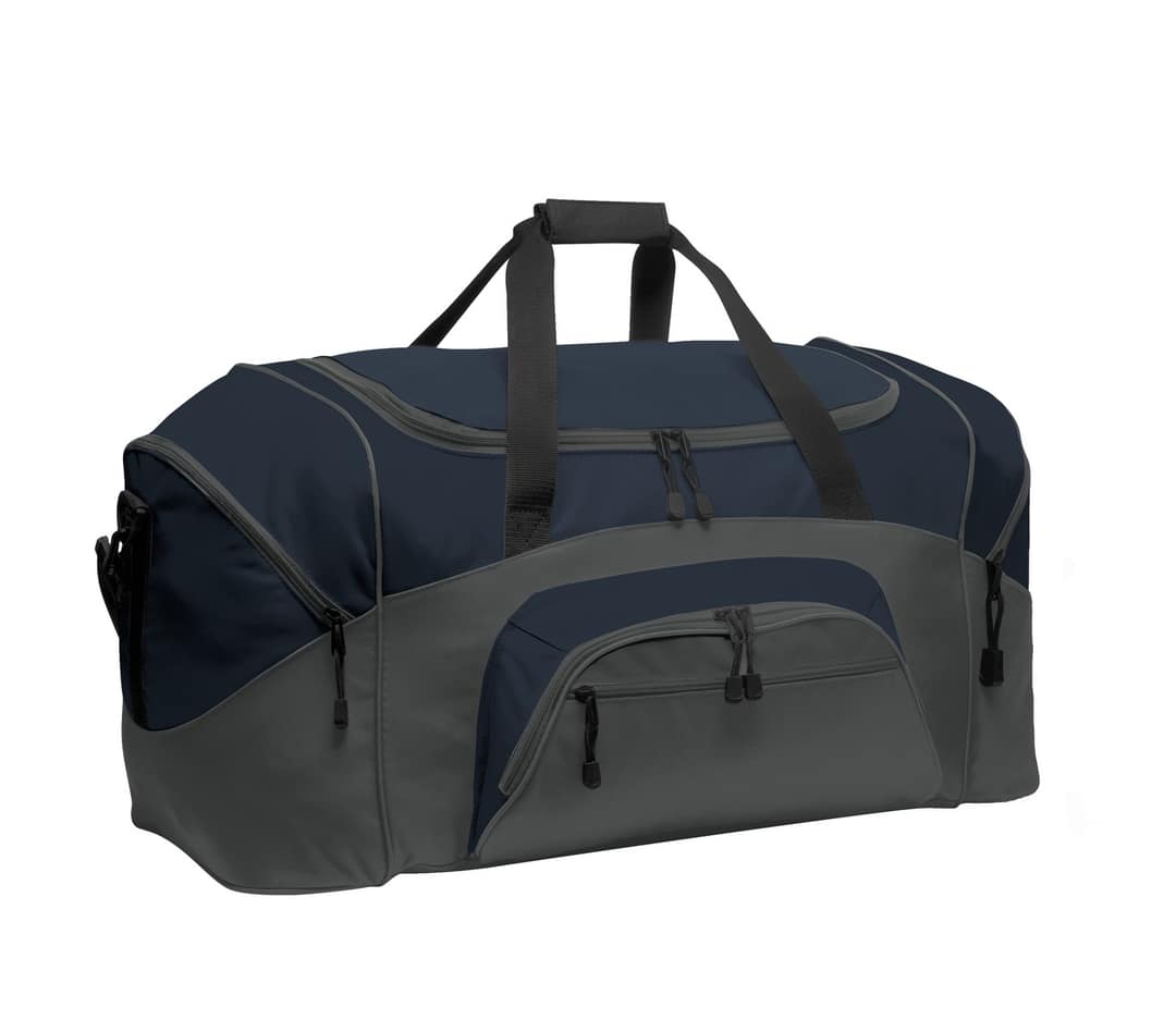 Port Authority BG99 Standard Colorblock Sport Duffel in Navy/ Dark Charcoal, on model
