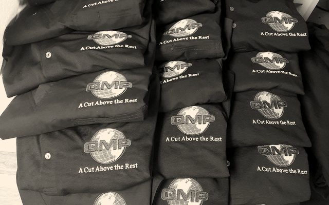 Embroidered polos stacked and ready for pickup