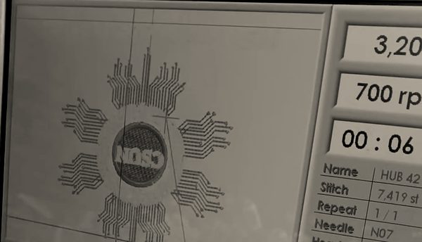 A stitch file shown on an embroidery machine's control screen
